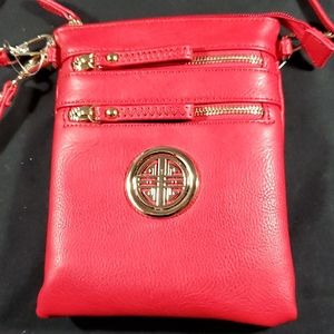 Red crossbody with logo.